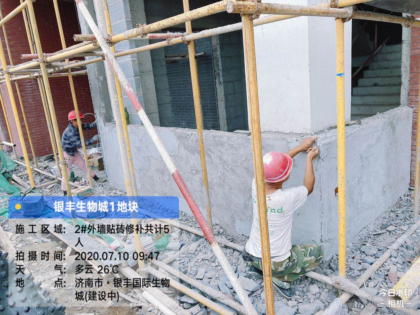 1594369204639396.jpg 1-2#楼外墙贴砖.jpg